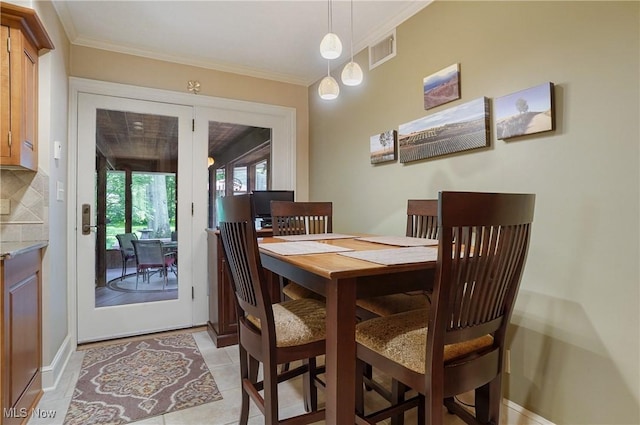 2925 Millboro Rd, Silver Lake, OH 44224 - dining area with crown molding and baseboards