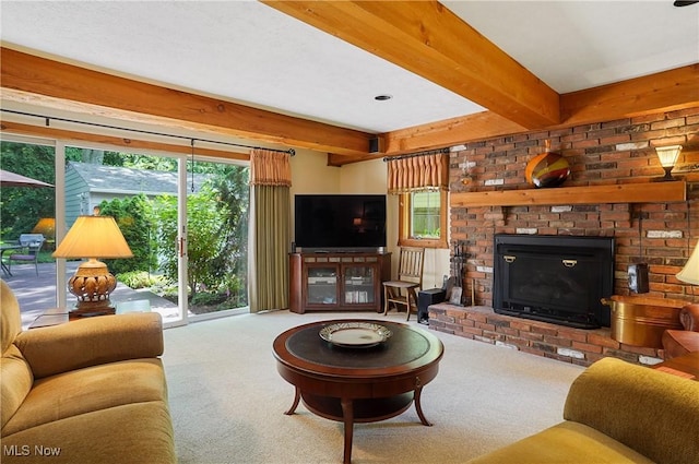 2925 Millboro Rd, Silver Lake, OH 44224 - living area with carpet floors, beam ceiling, and a fireplace