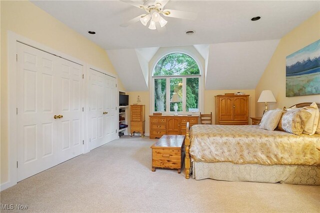2925 Millboro Rd, Silver Lake, OH 44224 - carpeted bedroom with two closets, lofted ceiling, and a ceiling fan