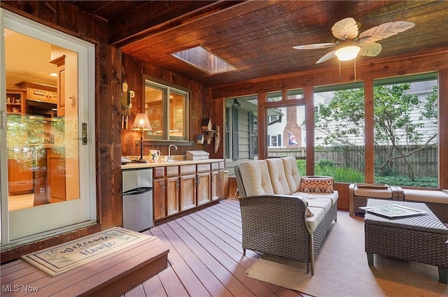 2925 Millboro Rd, Silver Lake, OH 44224 - sunroom / solarium with wooden walls, healthy amount of natural light, wood ceiling, and wood-type flooring