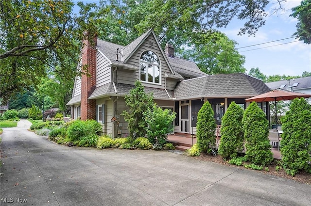 2925 Millboro Rd, Silver Lake, OH 44224 - view of front of home with a chimney and roof with shingles