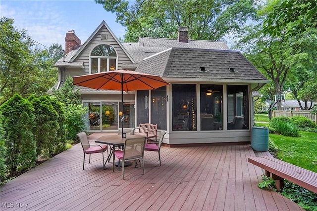 2925 Millboro Rd, Silver Lake, OH 44224 - wooden deck with a sunroom and outdoor dining area