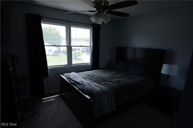 320 Lauretta Ln, Hubbard, OH 44425 - bedroom with dark carpet and a ceiling fan