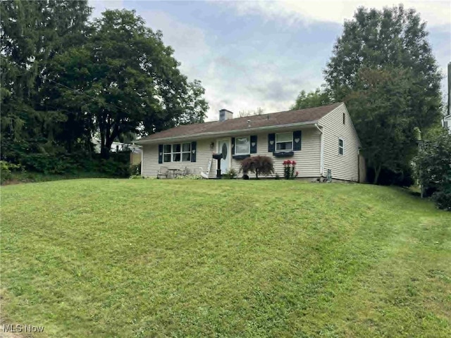 675 E 8th St, Salem, OH 44460 - single story home with a front yard and a chimney
