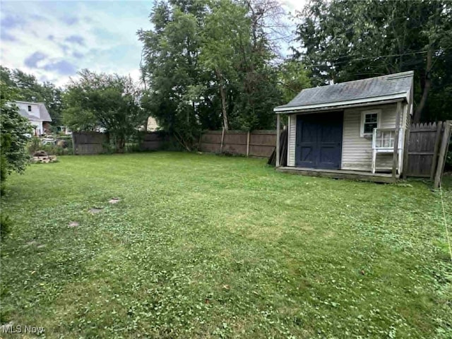 675 E 8th St, Salem, OH 44460 - fenced backyard featuring a storage unit