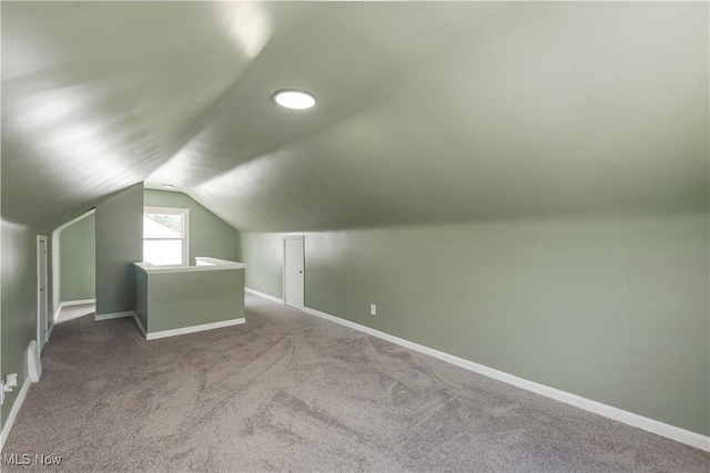 12800 Reindeer Ave, Garfield Heights, OH 44125 - additional living space with lofted ceiling and carpet floors