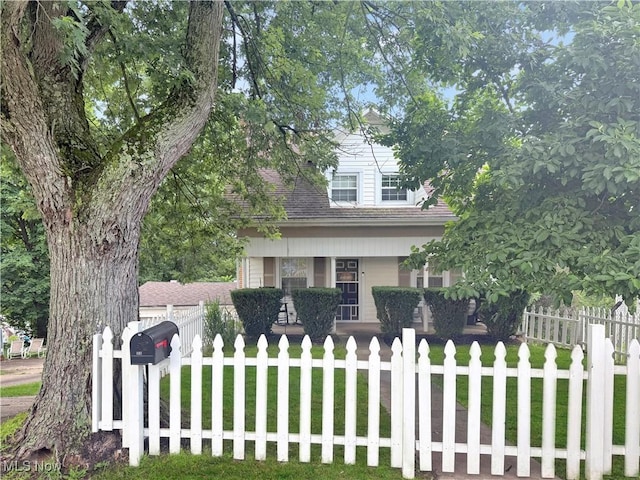 107 Harmon Ave, Weirton, WV 26062 - view of front facade with a porch and a fenced front yard