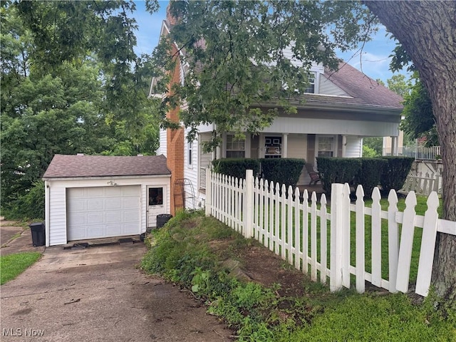 107 Harmon Ave, Weirton, WV 26062 - view of front of home with driveway, an outbuilding, and covered porch