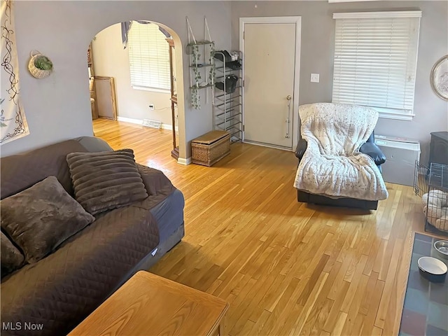 107 Harmon Ave, Weirton, WV 26062 - living room with wood finished floors and arched walkways