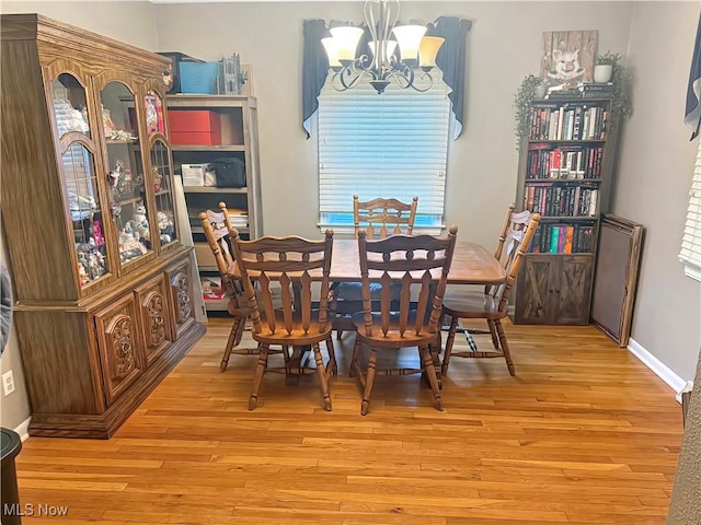 107 Harmon Ave, Weirton, WV 26062 - dining space featuring a chandelier and light wood-type flooring