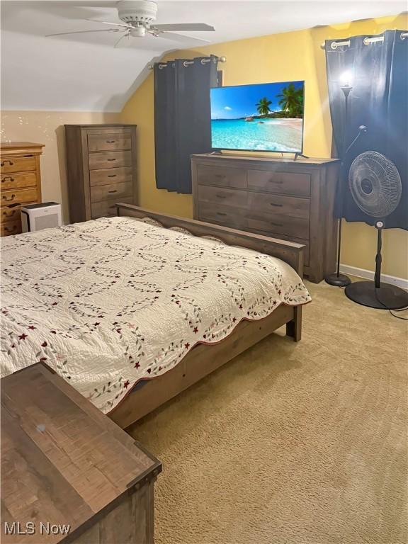 107 Harmon Ave, Weirton, WV 26062 - bedroom featuring carpet floors, vaulted ceiling, and a ceiling fan