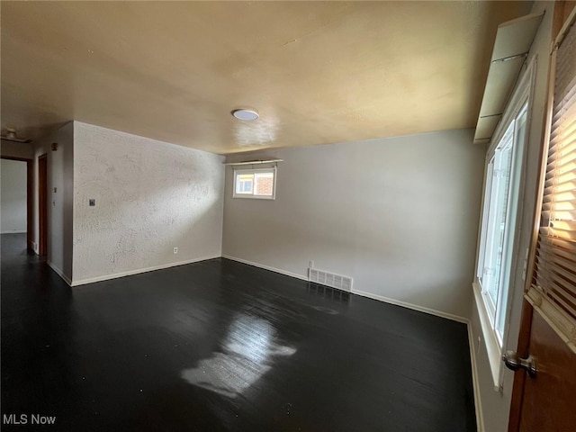 17005 Lipton Ave, Cleveland, OH 44128 - unfurnished room with dark wood-style floors
