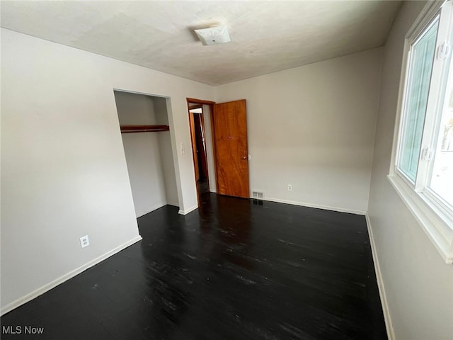 17005 Lipton Ave, Cleveland, OH 44128 - unfurnished bedroom featuring wood finished floors and a closet