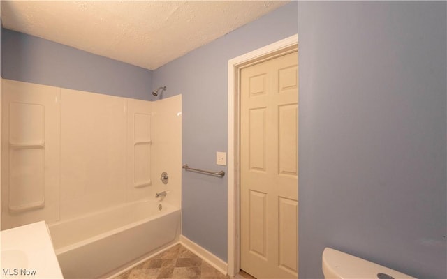 1022 Big Falls Ave, Akron, OH 44310 - bathroom with  shower combination and a textured ceiling