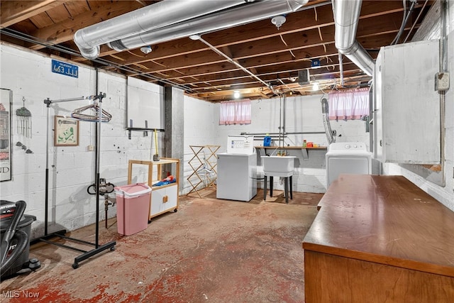 4095 W 161st St, Cleveland, OH 44135 - unfinished below grade area featuring washer and dryer