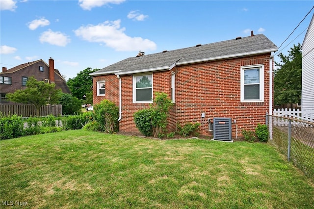 4095 W 161st St, Cleveland, OH 44135 - rear view of property featuring brick siding and roof with shingles