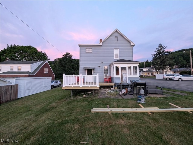 331 Louisiana Ave, Chester, WV 26034 - back of property with a deck and a chimney