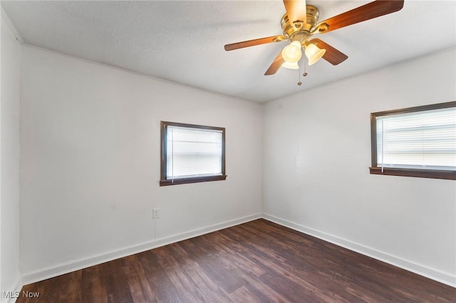 160 State St, Struthers, OH 44471 - spare room with plenty of natural light, wood finished floors, and a ceiling fan