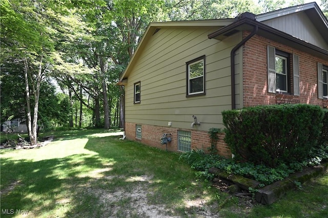 755 Blueberry Hill Dr, Canfield, OH 44406 - view of side of property featuring a lawn and brick siding