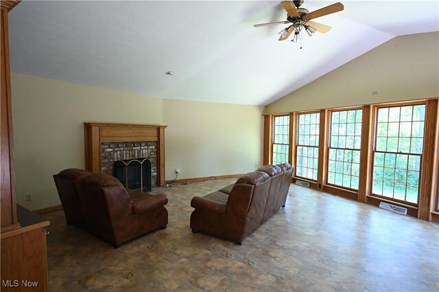 755 Blueberry Hill Dr, Canfield, OH 44406 - living area featuring vaulted ceiling, ceiling fan, and a fireplace