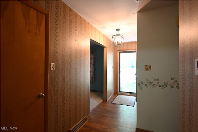 755 Blueberry Hill Dr, Canfield, OH 44406 - corridor with wallpapered walls, wood finished floors, and a chandelier