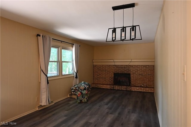 755 Blueberry Hill Dr, Canfield, OH 44406 - unfurnished living room featuring dark wood-style floors and a fireplace