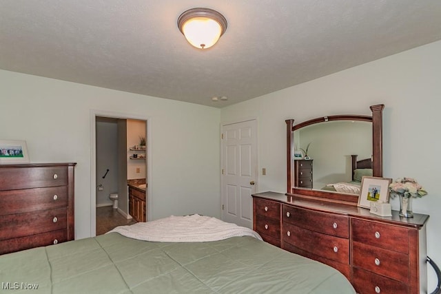 3886 Dugans Lndg, Perry, OH 44081 - bedroom featuring connected bathroom and baseboards
