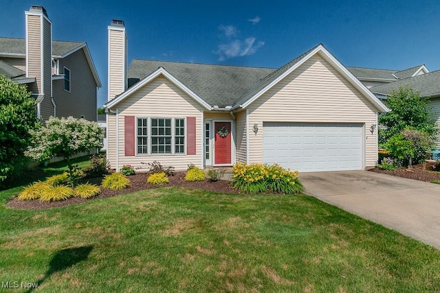3886 Dugans Lndg, Perry, OH 44081 - view of front facade featuring an attached garage, concrete driveway, and a front lawn