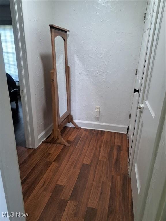 4016 State Route 7, Burghill, OH 44404 - empty room with dark wood-style flooring and a textured wall