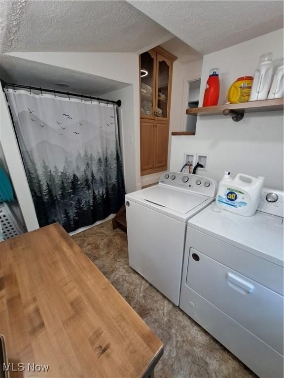 4016 State Route 7, Burghill, OH 44404 - laundry room with separate washer and dryer and a textured ceiling