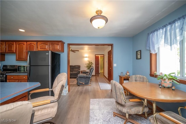 440 Lyons Ave, East Palestine, OH 44413 - dining area featuring light wood-type flooring and recessed lighting