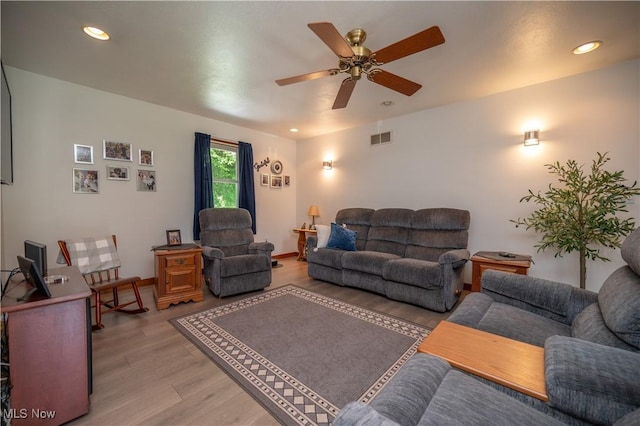 440 Lyons Ave, East Palestine, OH 44413 - living room with light wood-type flooring, ceiling fan, and recessed lighting