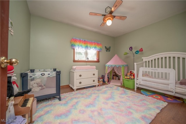 440 Lyons Ave, East Palestine, OH 44413 - bedroom with wood finished floors and a ceiling fan