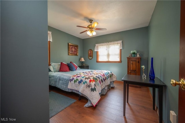 440 Lyons Ave, East Palestine, OH 44413 - bedroom featuring wood finished floors and ceiling fan