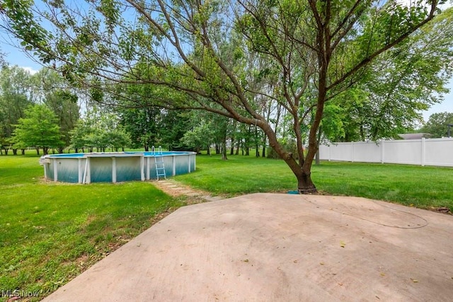 1005 Penn Ct, Grafton, OH 44044 - view of yard featuring an outdoor pool
