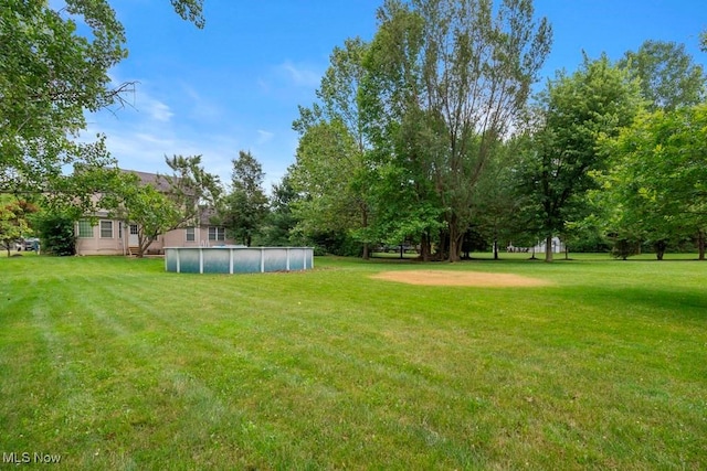 1005 Penn Ct, Grafton, OH 44044 - view of green lawn featuring an outdoor pool
