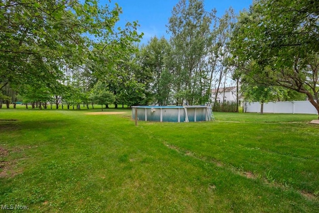 1005 Penn Ct, Grafton, OH 44044 - view of yard with an outdoor pool