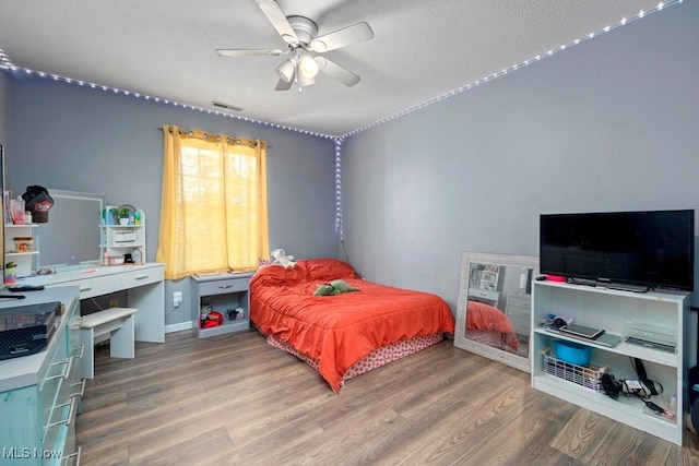 1005 Penn Ct, Grafton, OH 44044 - bedroom with wood finished floors and ceiling fan