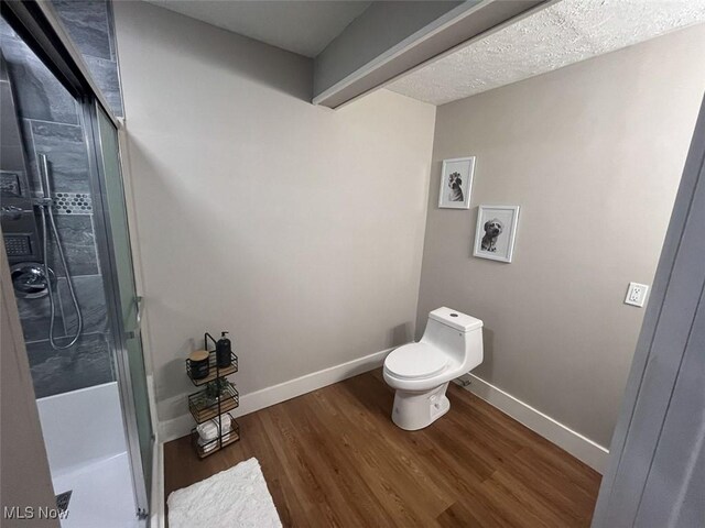 3402 Easton Rd, Norton, OH 44203 - bathroom with a shower stall and wood finished floors