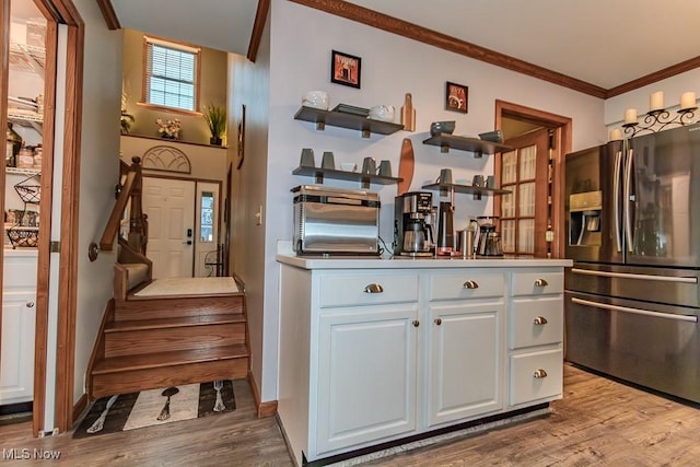 101 Middle Post Pt, Chardon, OH 44024 - kitchen featuring stainless steel fridge with ice dispenser, wood finished floors, crown molding, and open shelves
