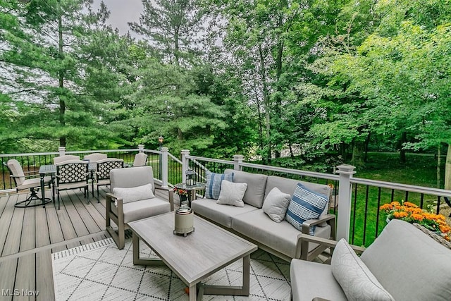 101 Middle Post Pt, Chardon, OH 44024 - wooden deck with an outdoor living space, outdoor dining space, and view of scattered trees