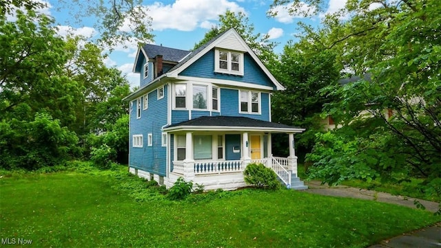 9907 Kempton Ave, Cleveland, OH 44108 - view of front of home featuring a porch and a front lawn
