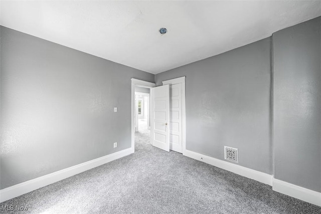 9907 Kempton Ave, Cleveland, OH 44108 - unfurnished bedroom with carpet floors