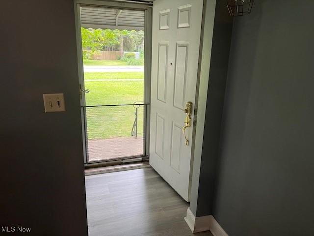 5559 Fitch Rd, North Olmsted, OH 44070 - entryway with wood finished floors and baseboards
