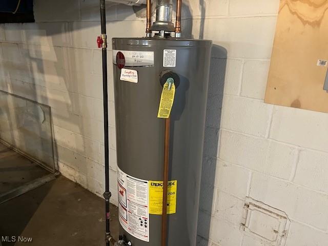 5559 Fitch Rd, North Olmsted, OH 44070 - utility room featuring water heater
