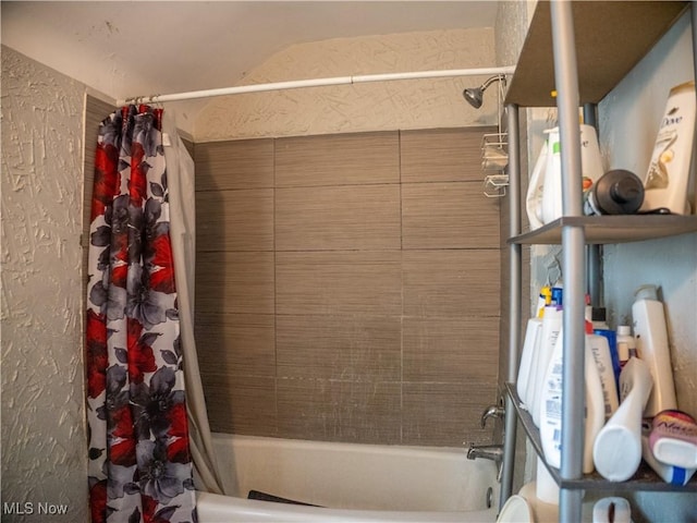 931 Yellowstone Rd, Cleveland, OH 44121 - full bathroom featuring shower / bathtub combination with curtain and a textured wall