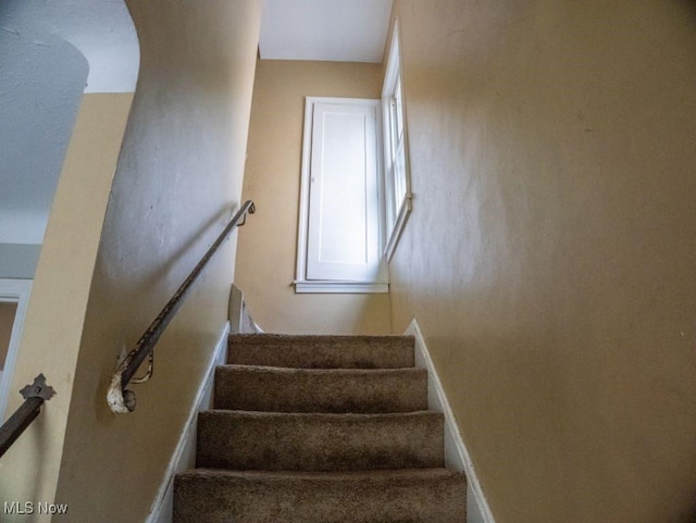 931 Yellowstone Rd, Cleveland, OH 44121 - stairs featuring baseboards
