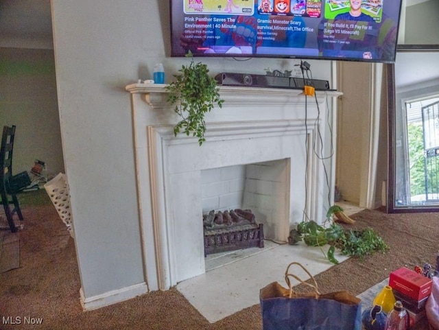 931 Yellowstone Rd, Cleveland, OH 44121 - detailed view of a fireplace with flush hearth and carpet