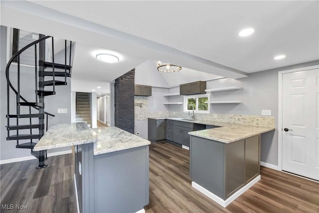 3781 Main St, Perry, OH 44081 - kitchen with open shelves, dark wood-type flooring, gray cabinets, a peninsula, and light stone countertops