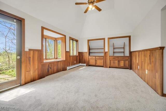 38038 Ridge Rd, Willoughby, OH 44094 - unfurnished room featuring a wainscoted wall, a baseboard heating unit, carpet flooring, vaulted ceiling, and a ceiling fan